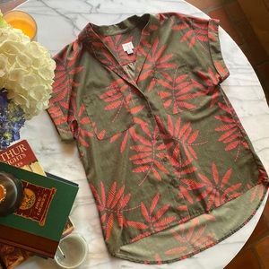 Collared green blouse with pink and coral leaf detail. Perfect for a vacation!